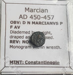 #i464# Small Roman Bronze Ae4 coin issued by Marcian from 450-457 AD