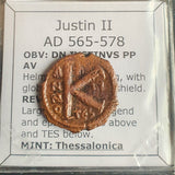 #o560# Byzantine 1/2 follis coin of Justin II from 565-578 AD