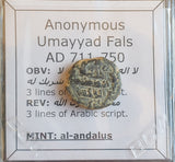 #o669# Anonymous Umayyad Fals copper coin from 711-750 AD