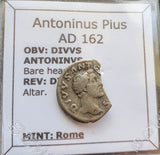 #i933# Roman silver denarius coin of Antoninus Pius from 162 AD