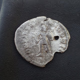 #p384# Roman silver denarius coin of Caracalla from 205 AD
