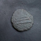 #o667# Anonymous copper Umayyad Fals coin from Spain 756-929 AD