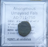#p400# Anonymous Umayyad Fals copper coin from 711-750 AD