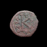 #g304# Byzantine 1/2 follis coin of Justin II from 565-578 AD