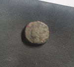 #e022# Greek Seleucid ae12 coin of Antiochos III, minted between 223-187 BC.