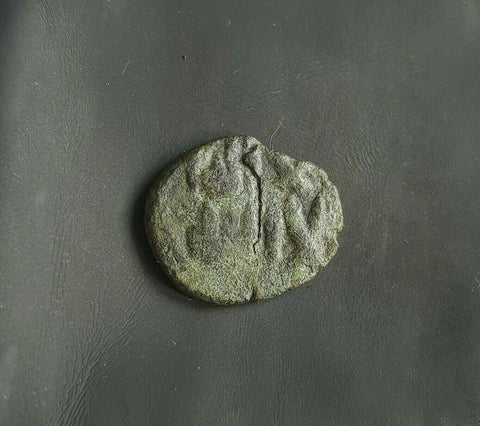 #i989# Anonymous copper Umayyad Fals coin from Spain 711-750 AD