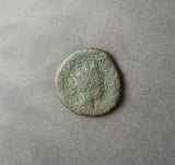 #g523# Roman bronze coin of Tetricus II from 272-274 AD