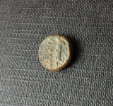Greek bronze ae11 coin from Seleucid King Antiochus III, 222-187 BC